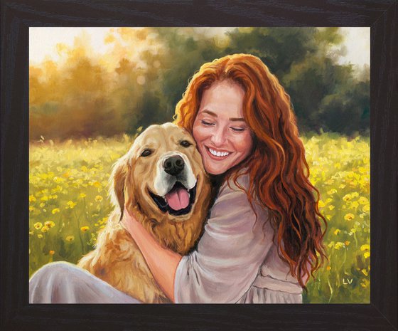 Smiling red-haired woman hugging a dog