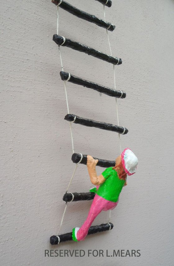 Girl climbing the ladder