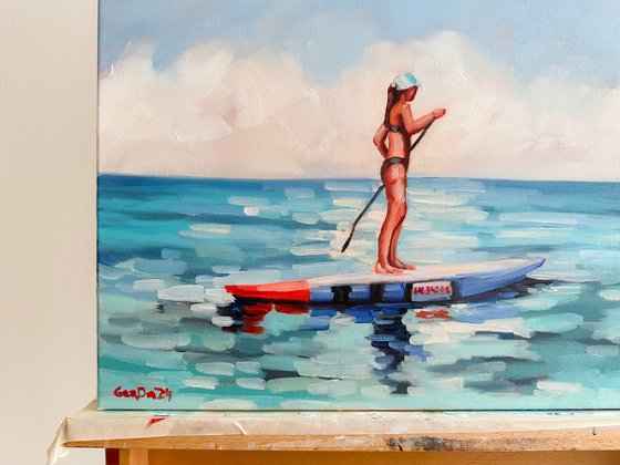 Woman on Paddle Board