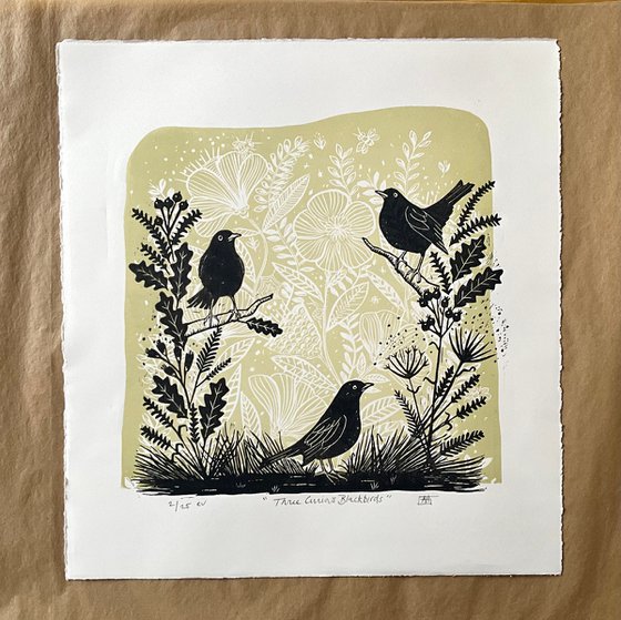 Three Curious Blackbirds