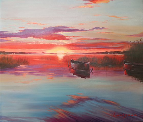 Sunset on the lake with boats landscape