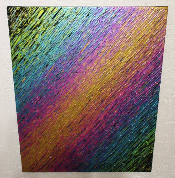 Iridescent gold pink blue green knife texture