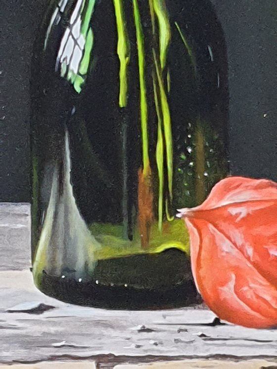 Green bottle with lanterns (Physalis)