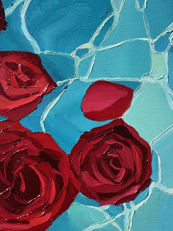 Crimson petals.Blue silence