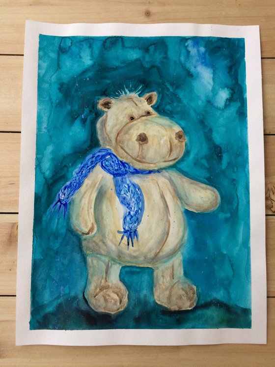 Toy hippo in blue scarf