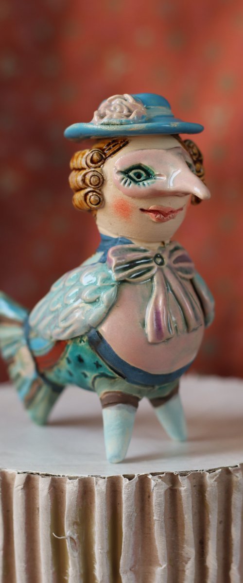 Tiny Masked Bird. Ceramic sculpture. by Elya Yalonetski