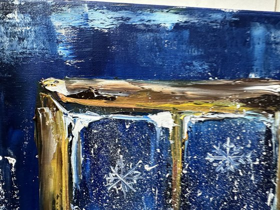 Winter window and candle