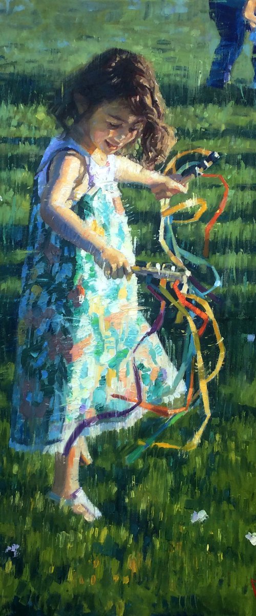 A little girl playing games by Paul Cheng