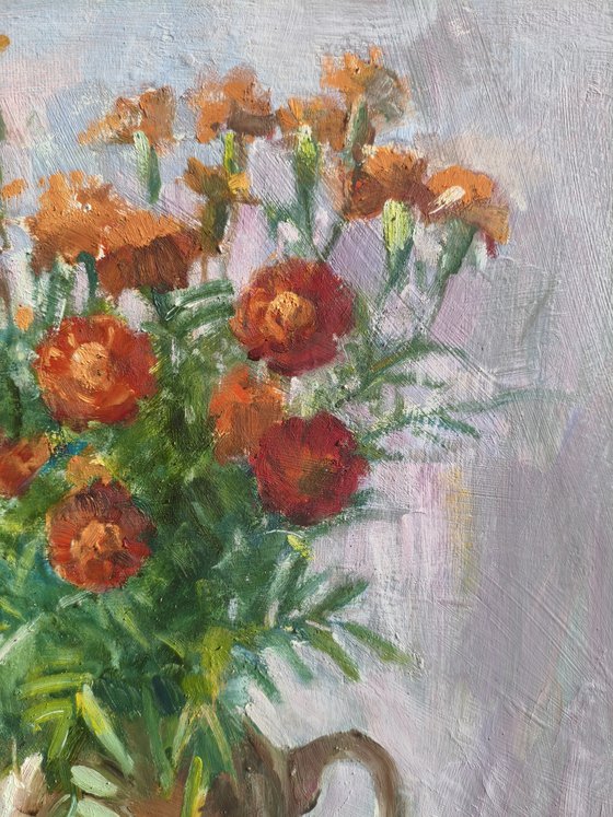 Marigolds in a clay pot