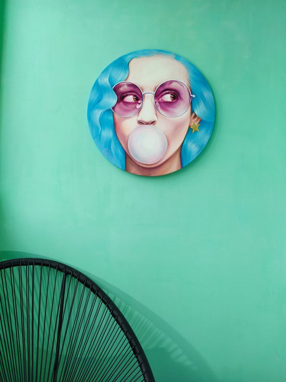 Painting "Girl with bubble gum" on a round stretcher 58 cm (22.83 inches) With blue hair and pink glasses