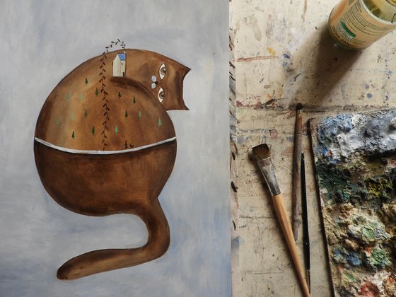 The family cat in brown