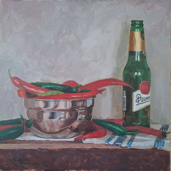 A bottle and chili peppers