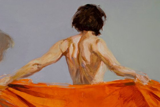 woman with orange on black and grey