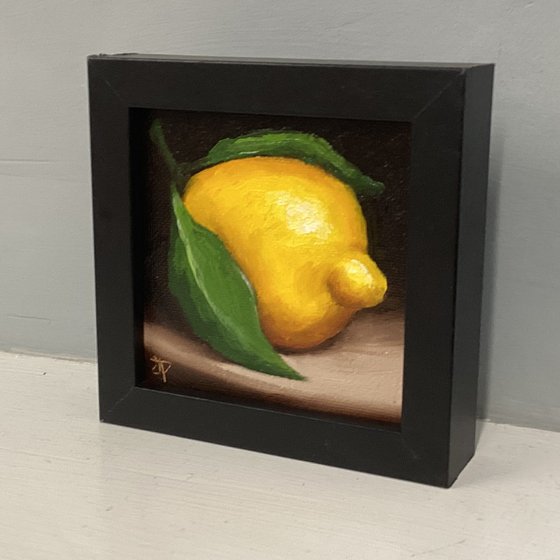 Little leafy lemon still life