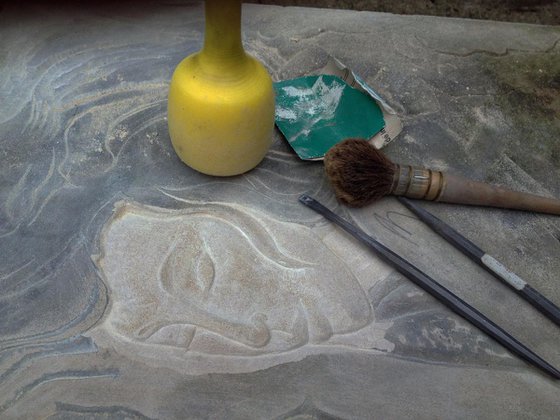 When Nyx draws her cloudy cloak; low relief carving in limestone