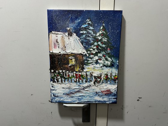 House in the winter forest