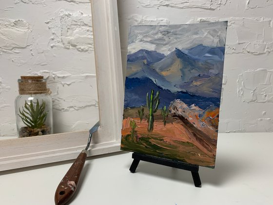 Mountains and cacti.