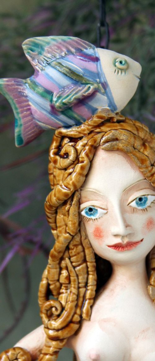 Mermaid with a fish,  Wall sculpture by Elya Yalonetski. by Elya Yalonetski