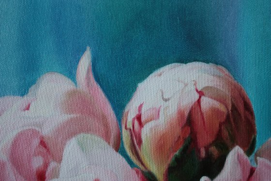 Bouquet of pink peonies on a blue background
