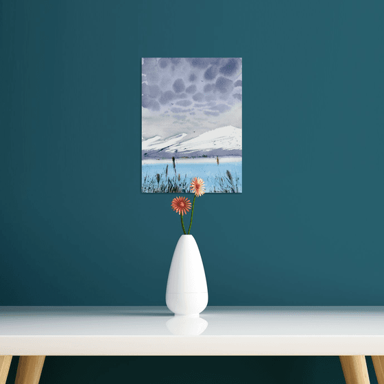 BLUE LAKE IN THE MOUNTAINS