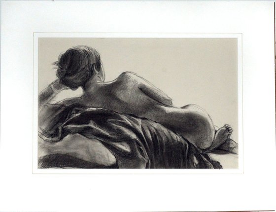 Life Drawing of girl leaning against a cloth