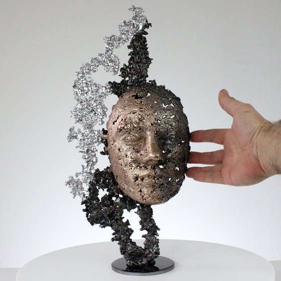 A tear 51-21 - Face metal sculpture lace bronze steel chrome