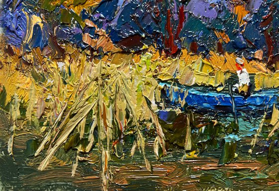 On a boat among the reeds