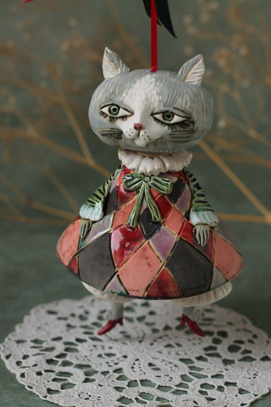 Little pussycat in harlequin dress. Hanging sculpture, bell doll by Elya Yalonetski