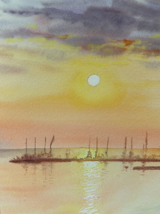 Serene Sunset over a Seaside Town