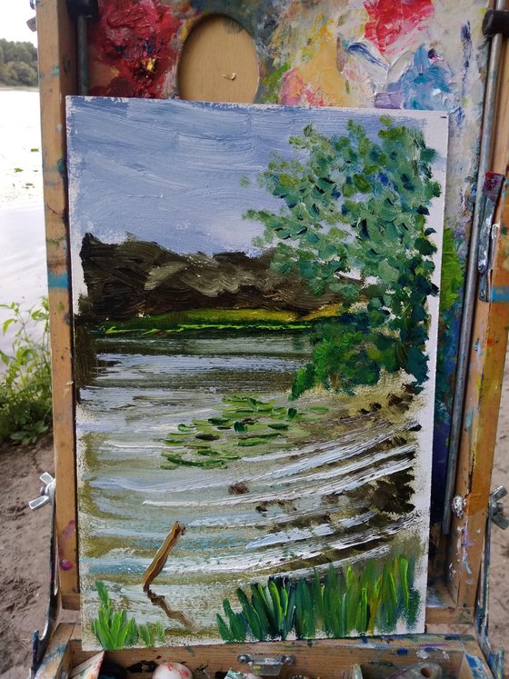 Riverbank on a windy day. Pleinair painting