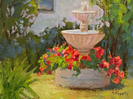 Fountain And Red Flowers