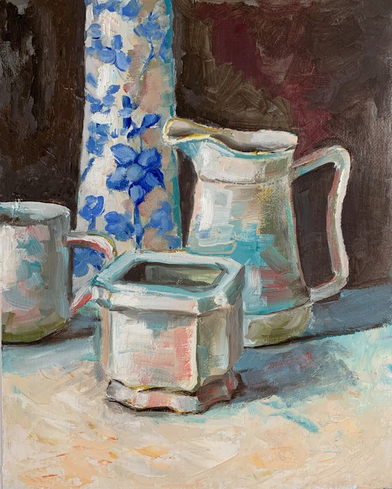 Teacup and milk jug.