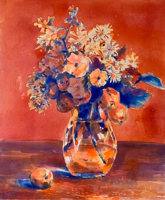 Still life flowers and apples on the table on a bright orange background