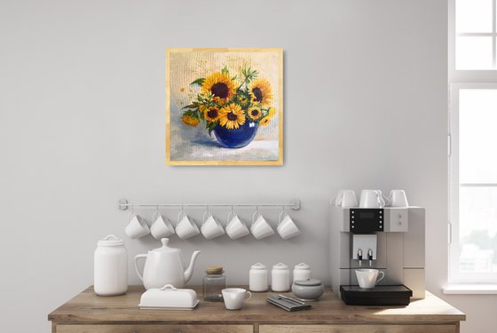 Sunflowers bouquet in a blue glass vase still life