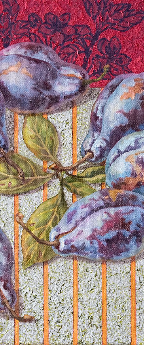 Plums with leaves on silver background by Mariia Meltsaeva