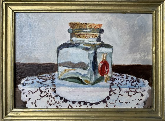 Still life with a glass jar.