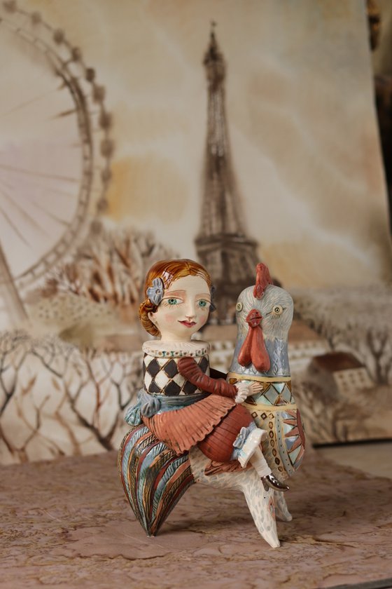 Vintage dressed girl riding the rooster. From "Le Carousel, Hommage à l'Innocence" project by Elya Yalonetski