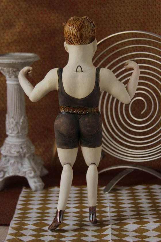 Circus athlete, trendy Strongman. Wall sculpture by Elya Yalonetski.