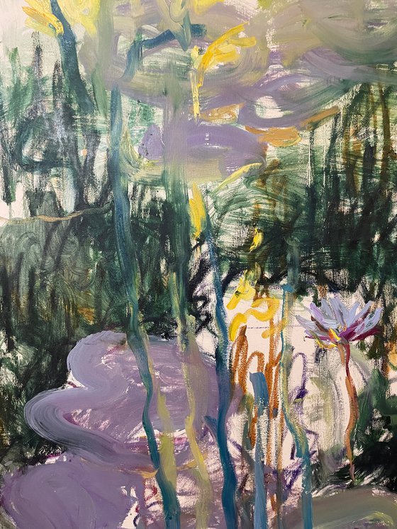 At the edge of the lily pond.