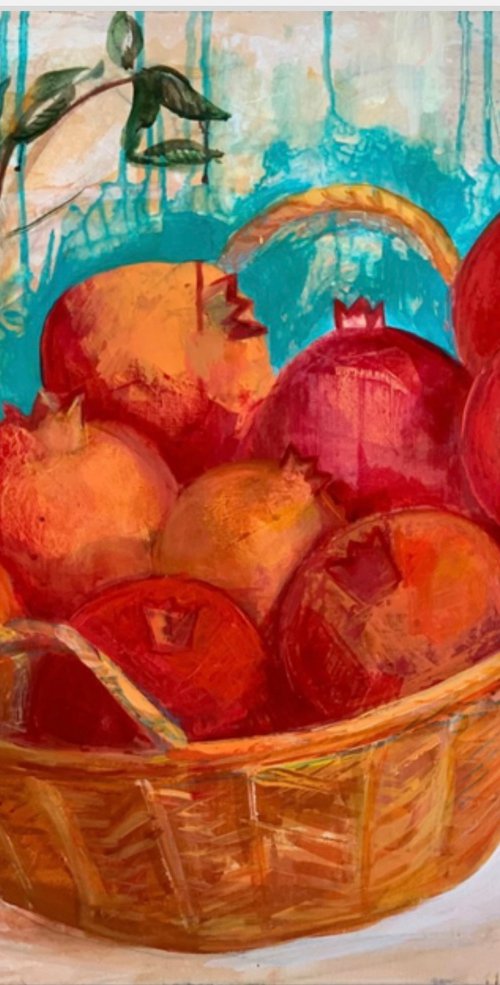 Pomegranate in basket by Olga Pascari