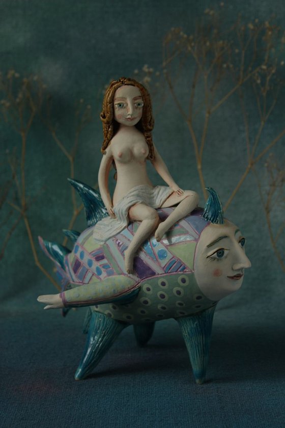 Girl riding the moon fish. Sculpture by Elya Yalonetski, 2018