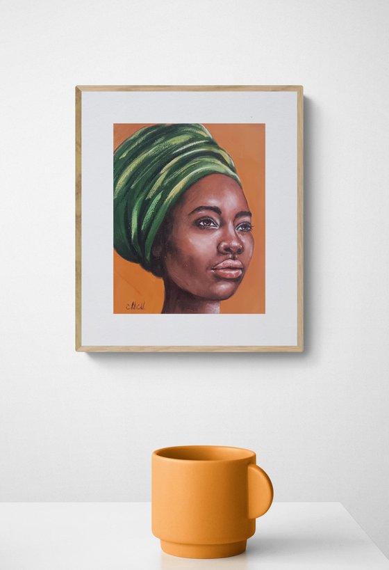 African woman with green scarf
