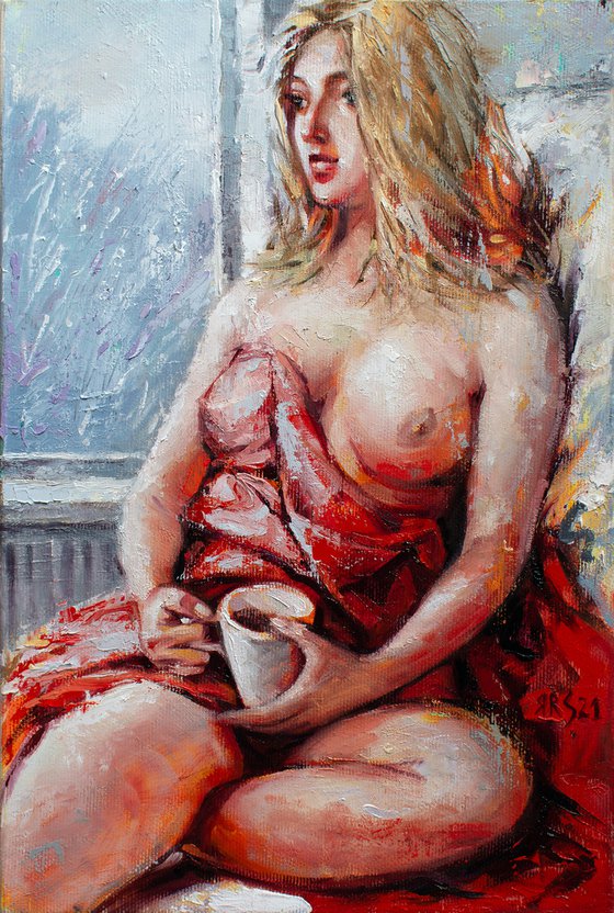 WINTER MORNING - Cozy Days at Home: Beautiful Blonde Enjoying a Cup of Hot Tea by the Window and Watching the Snowstorm