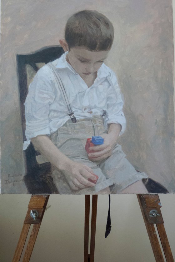 Boy with red and blue cubes