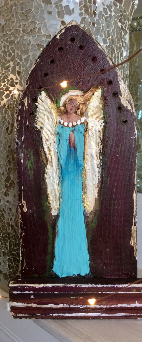 ANGEL OF THE HEART             WOODEN SCULPTURE. by Roma Mountjoy