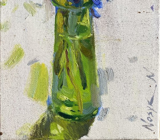 Blue Flowers in Green Vase