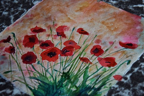 Floral watercolor painting on craft paper Red poppies with golden sky