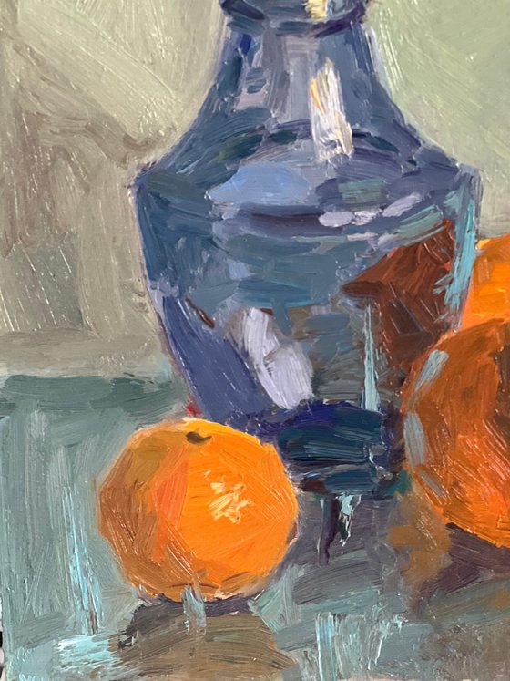 Oranges and blue glass