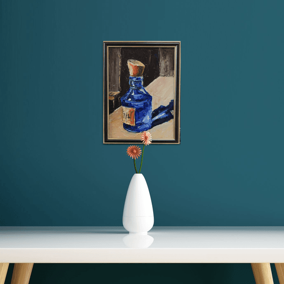 Blue glass mystery bottle.