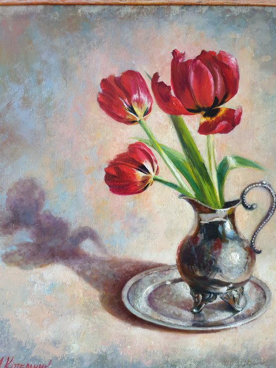 Tulips in a beautiful vase.